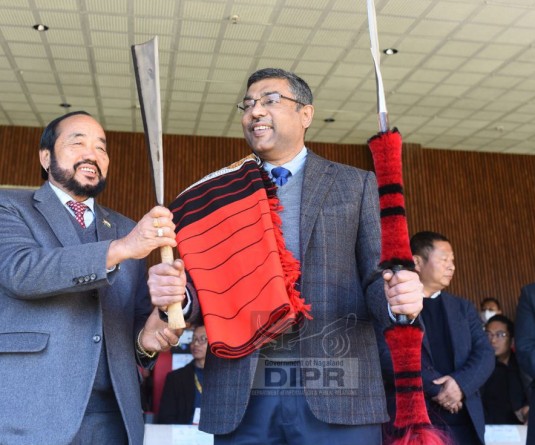 Deputy Chief Minister, Y Patton felicitating Secretary, Ministry of Electronics and Information Technology, S Khrishnan, during the Hornbill Cultural Show at Naga Heritage Village, Kisama, Kohima on December 7. (DIPR Photo)